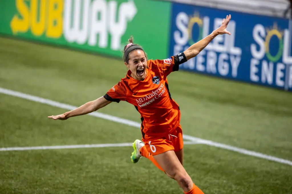 Shea Groom celebrates a goal.