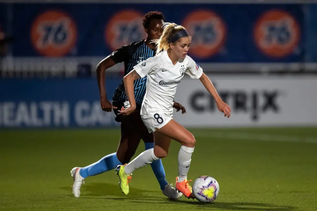 Imani Dorsey and Denise O'Sullivan on soccer field / JWS