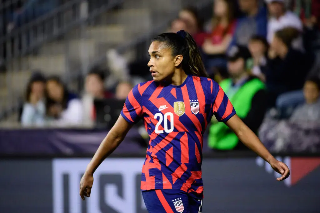 uswnt forward catarina macario on the field against uzbekistan