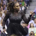 Serena Williams celebrates a point at net at the US Open.