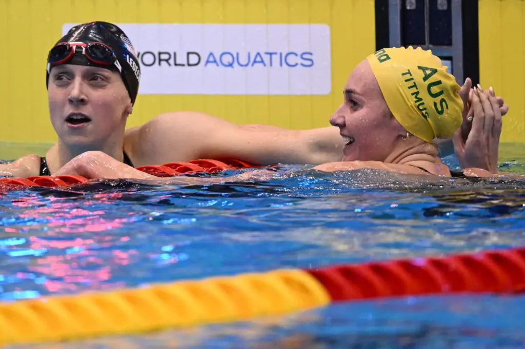 FUKUOKA, JAPAN - JULY 23: Ariarne Titmus of Team Australia (R) reacts after winning gold in the Women's 400m Freestyle Final in a new world record time of WR 3:55.38 on day one of the Fukuoka 2023 World Aquatics Championships at Marine Messe Fukuoka Hall A on July 23, 2023 in Fukuoka, Japan.
