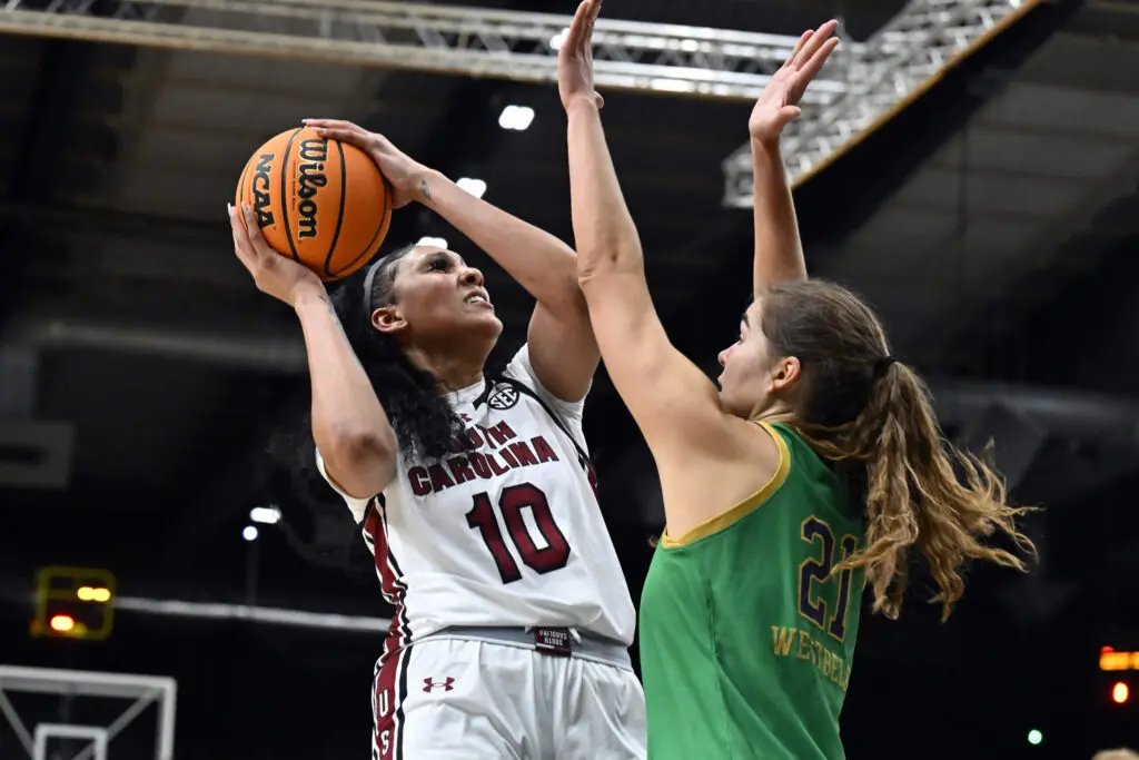 Kamilla Cardoso fights for possession with Maddy Westbeld during the Aflac Oui Play match between South Carolina and Notre Dame at Halle Georges Carpentier on November 06, 2023 in Paris, France. (Aurelien Meunier/Getty Images)