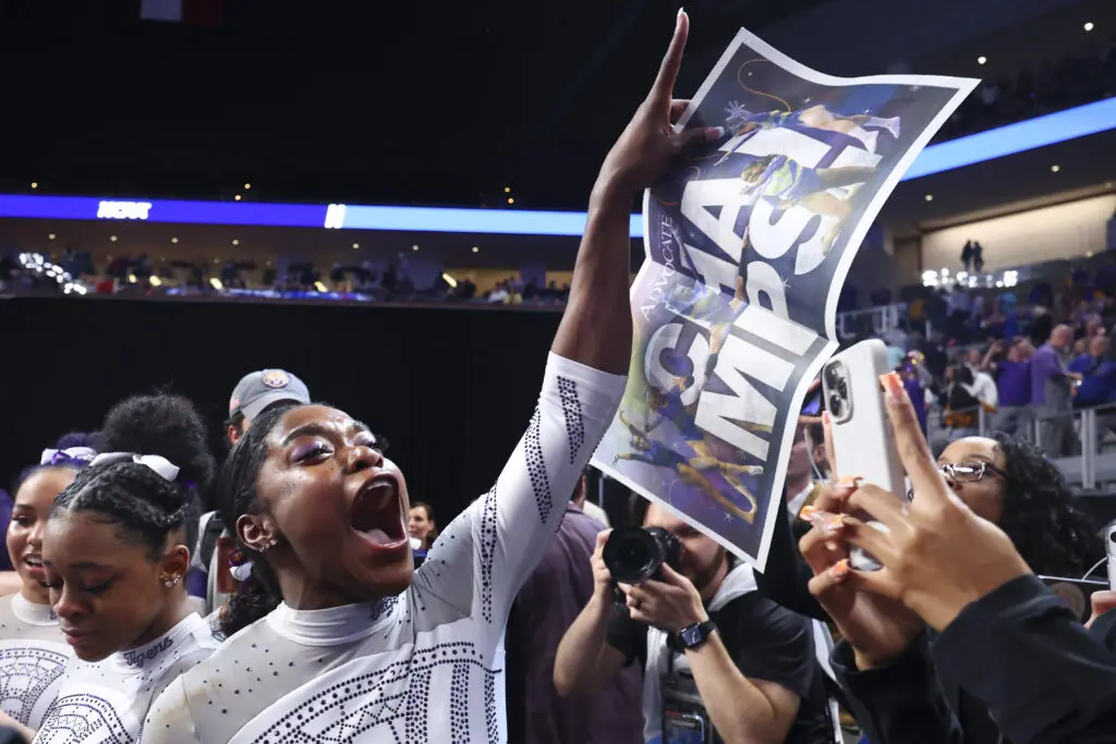 Kiya Johnson of the LSU Tigers reacts after winning the national championship during the Division I Women's Gymnastics Championships