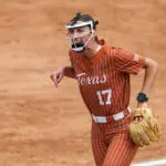 Texas pitcher Teagan Kavan (17) celebrates by screaming after closing out the second inning of the Big 12 college softball game