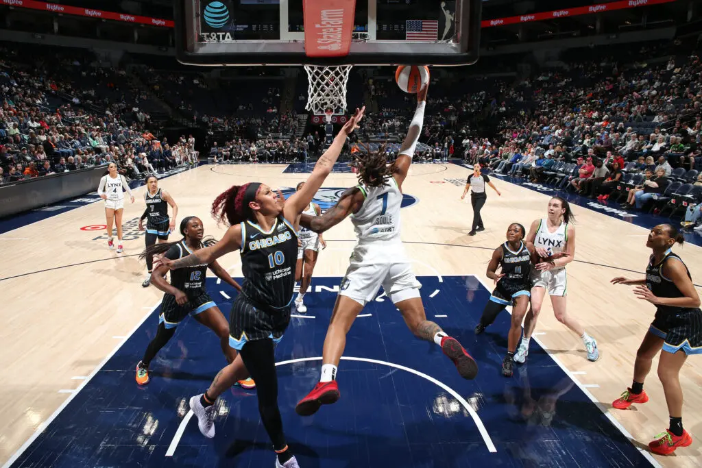 kamilla cardoso just for the ball in a preseason game between chicago sky and minnesota lynx