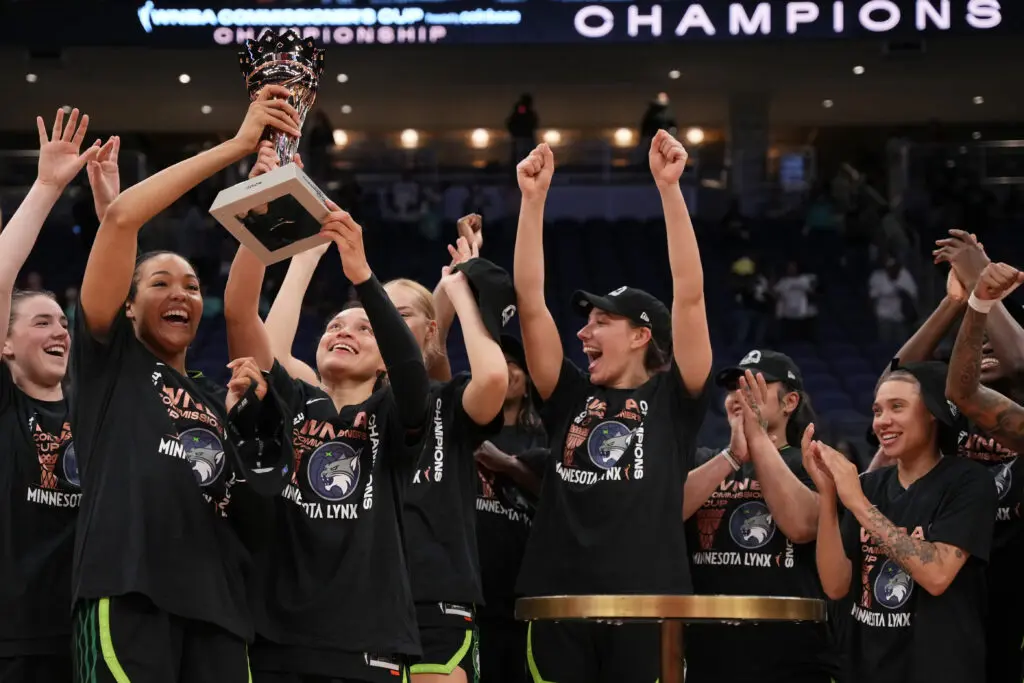 lynx raising commissioner's cup trophy