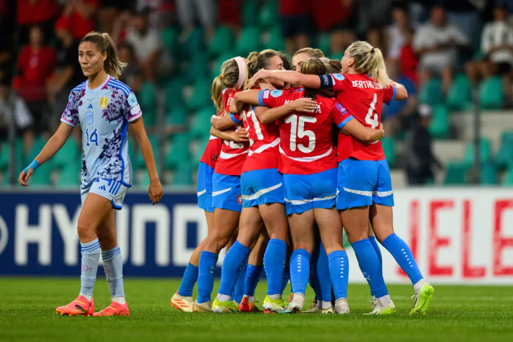 Czechia national soccer team celebrates as Spain women's national soccer team defender Laia Aleixandri leaves the pitch