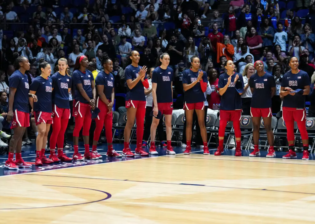 Team USA stands on the sideline before their final Olympic tune-up against Germany