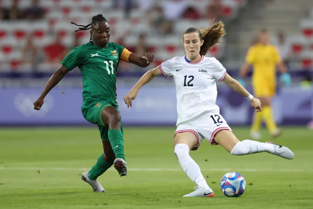 USWNT center-back Tierna Davidson keeps the ball away from prolific Zambia striker Barbra Banda on Thursday