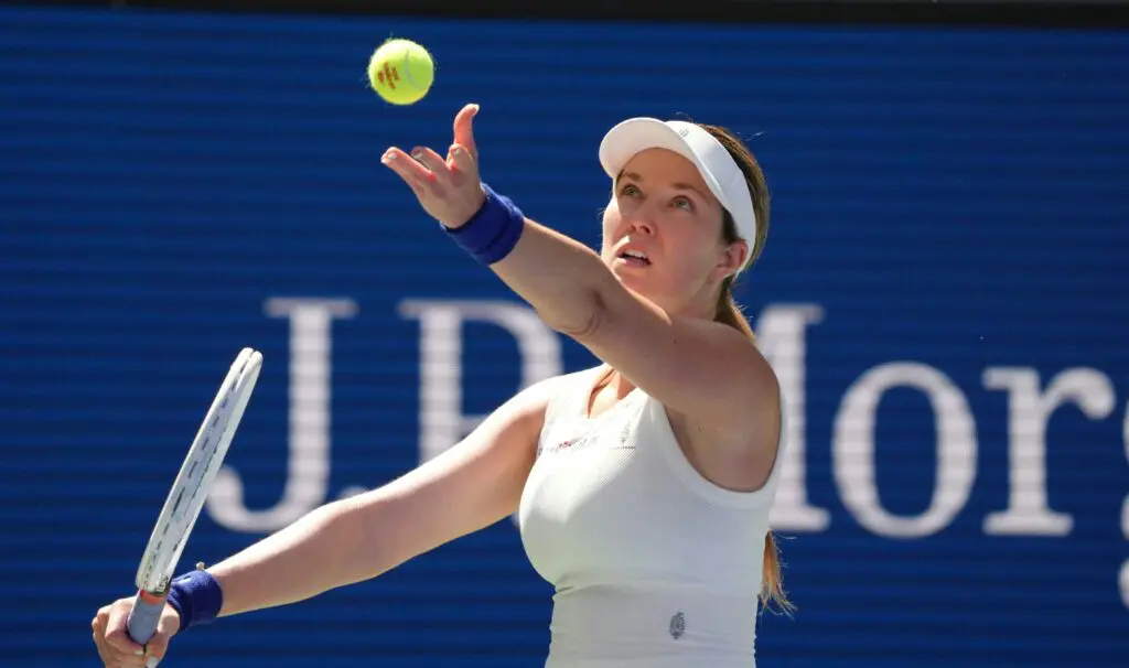 No. 11 Danielle Collins tosses a tennis ball up for a serve in her first-round US Open loss on Tuesday