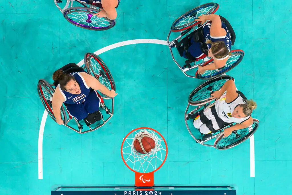 Team USA wheelchair basketball player Becca Murray plays against Germany's Swenja Mayer at the 2024 Paris Paralympic Games