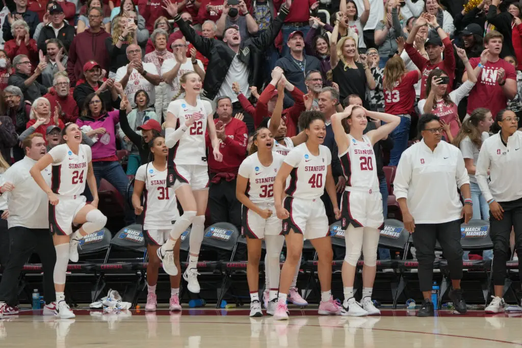 Stanford players react during a 2024 March Madness NCAA women's college basketball game.