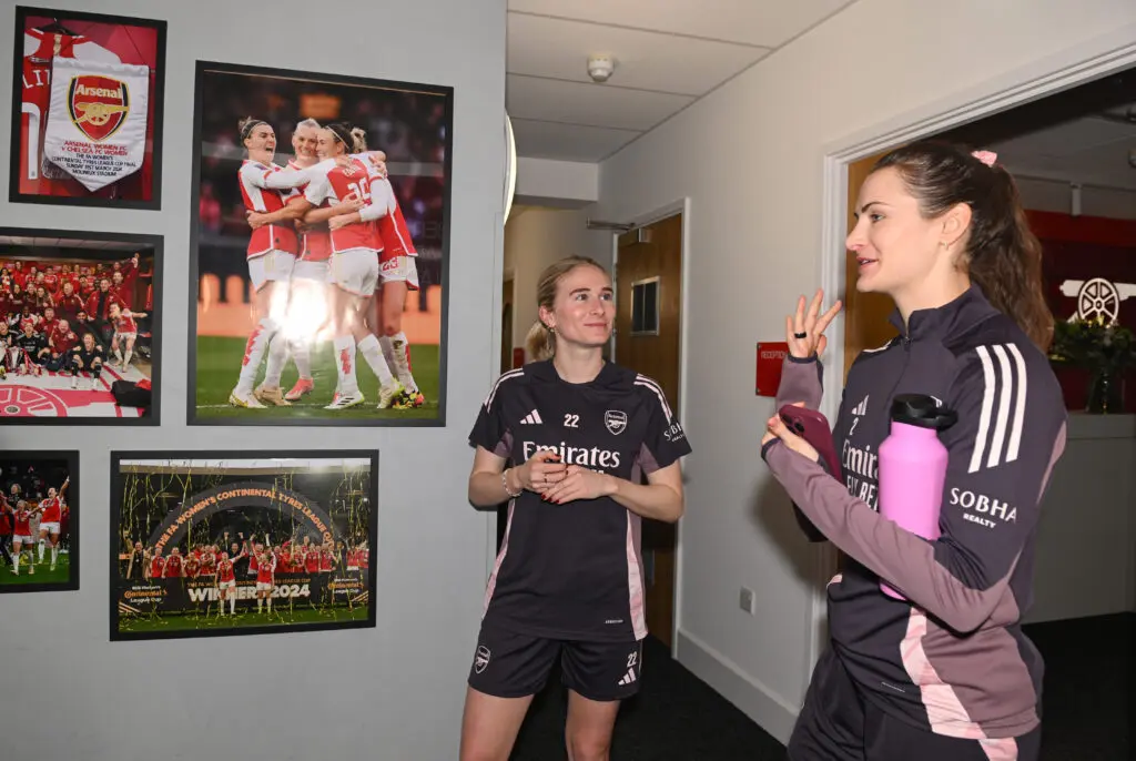 Emily Fox greets former Gotham star Jenna Nighswonger as she arrives to sign for Arsenal in England.