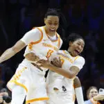 Tennessee basketball players Jewel Spear and Zee Spearman celebrate their 80-76 upset win over UConn.