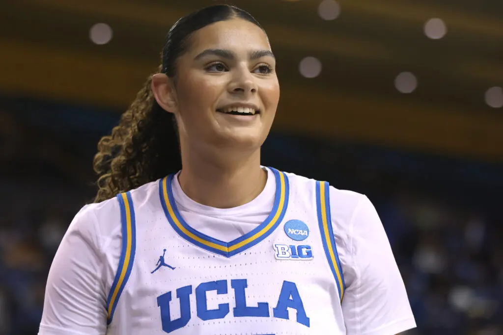 2024/25 National Player of the Year finalist Lauren Betts smiles during UCLA's second-round March Madness game.