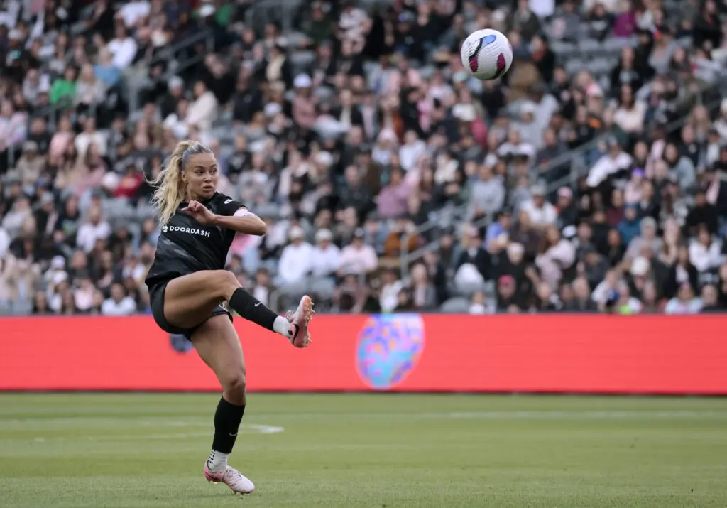 NWSL player Sarah Gorden (captain) #11 of Angel City FC passes during a 2-1 win over the Seattle Reign FC at BMO Stadium on March 30, 2025 in Los Angeles, California. (