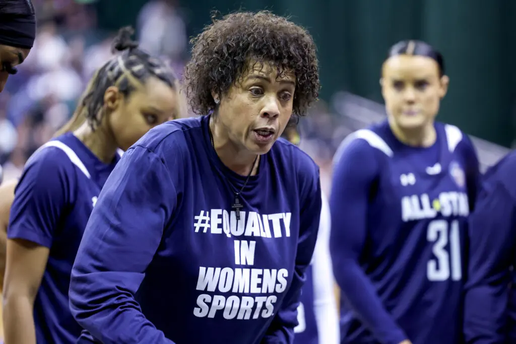 Team Miller head coach Cheryl Miller huddles with her team during the third quarter of the Women's College All-Star Game between Team Lieberman and Team Miller.