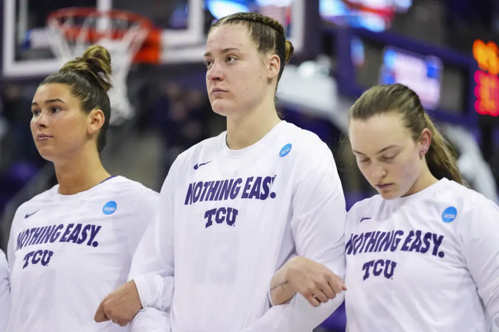 Center Sedona Prince looks on before TCU's 2025 March Madness first-round game.