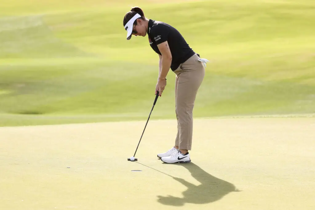 Australian golfer Hannah Green lines up a putt at the 2025 Ford Championship.