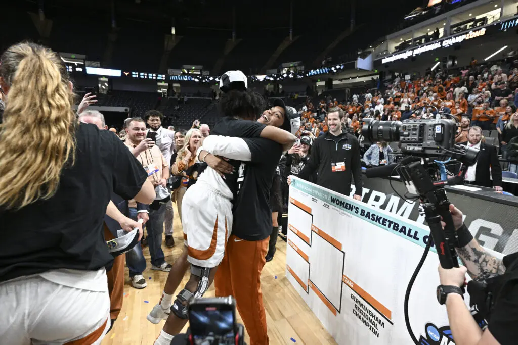 Final Four player Madison Booker #35 the Texas Longhorns celebrates after defeating the TCU Horned Frogs in the Elite Eight round of the 2025 NCAA Women's Basketball Tournament.