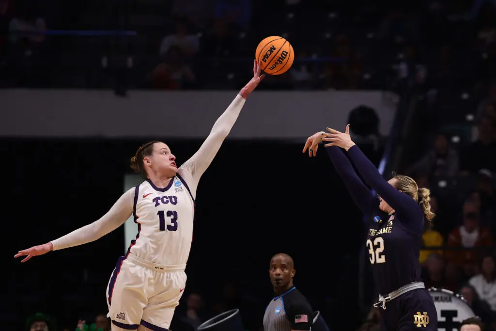 Sedona Prince blocks a shot from Notre Dame's Liza Karlen during TCU's 2025 Sweet 16 victory. 