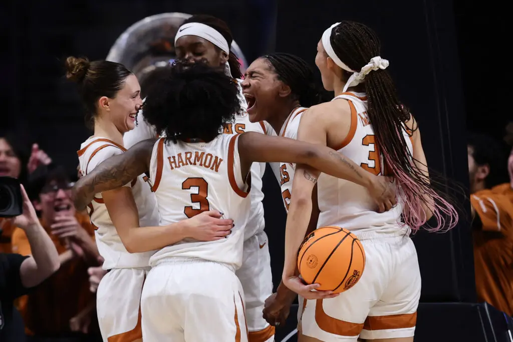 Final Four team Texas Longhorns celebrate during the second half against the TCU Horned Frogs in the Elite Eight round of the NCAA Women's Basketball Tournament.