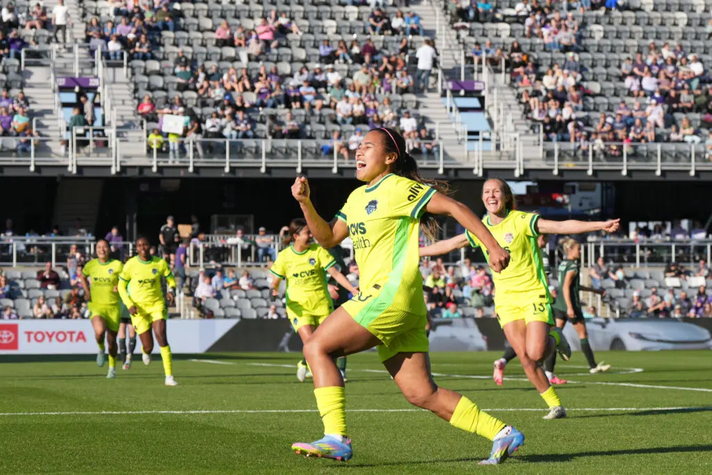 Midfielder Leicy Santos celebrates a goal in the Washington Spirit's 2-0 defeat of Racing Lousiville on Saturday.