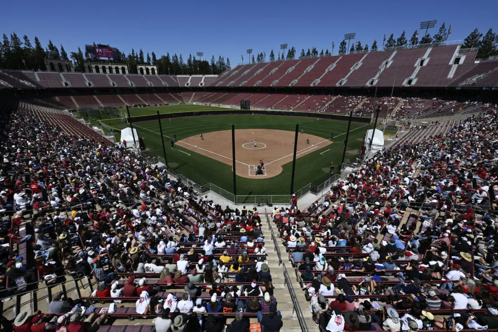 An NCAA record crowd watches Stanford softball host Cal in the school's football stadium on Saturday.