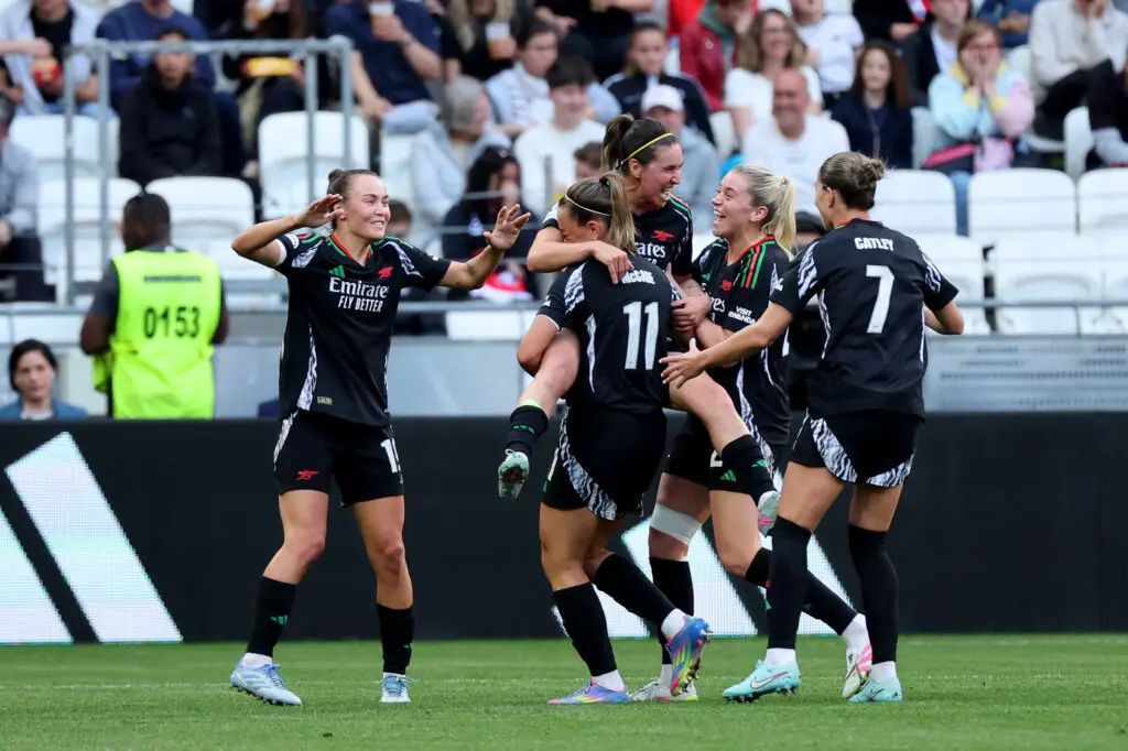 Arsenal celebrates Mariona Caldentey's goal during their 2024/25 Champions League second-leg semifinal win over Lyon.
