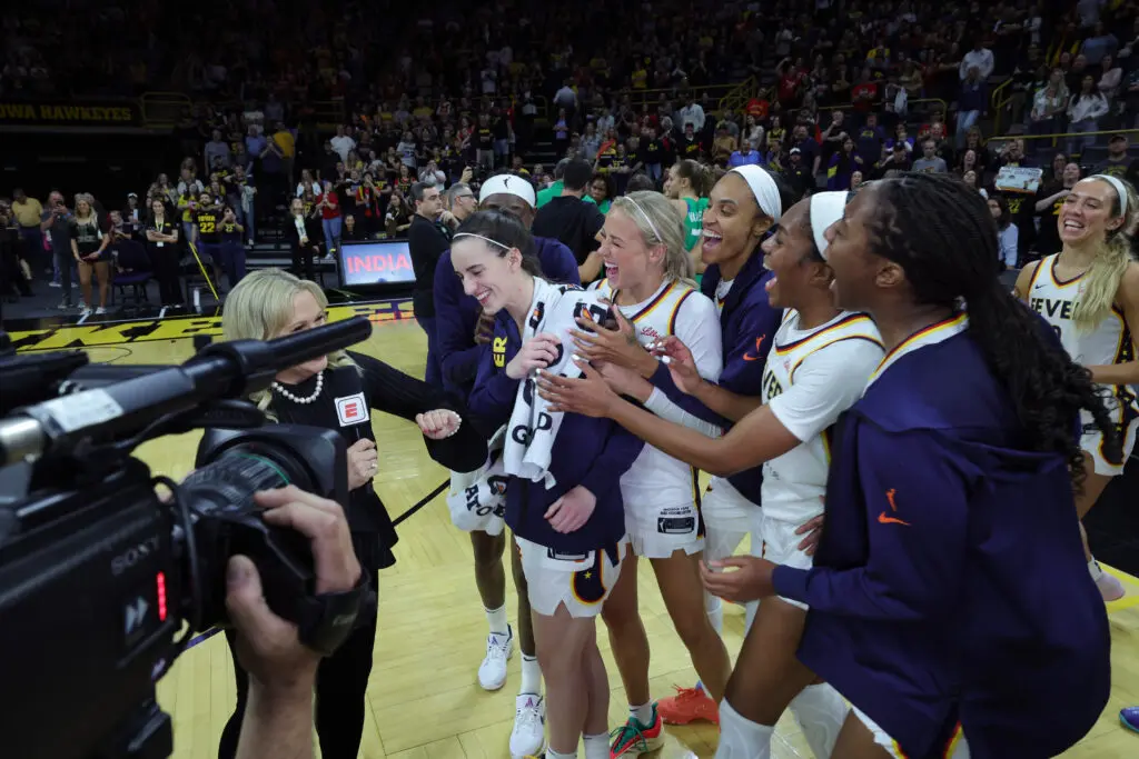 Caitlin Clark and her Indiana Fever teammates celebrate their big preseason exhibition win over Brazil on Sunday.