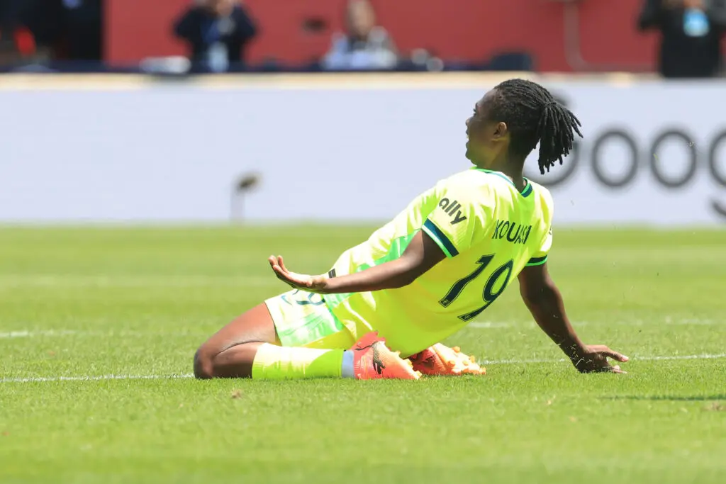 Washington's Rosemonde Kouassi celebrates scoring a goal during a 2025 NWSL match.