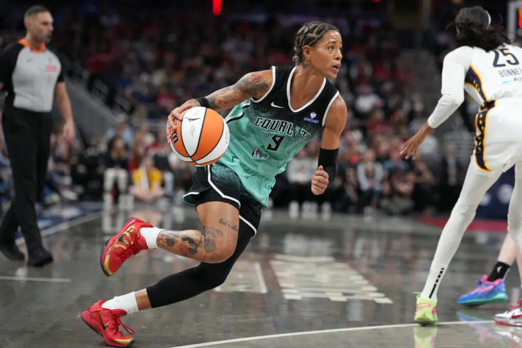 2025 Liberty addition Natasha Cloud dribbles the ball during a WNBA game.
