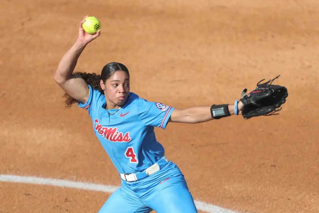 Ole Miss pitcher Aliyah Binford winds up during a 2025 NCAA softball postseason game.