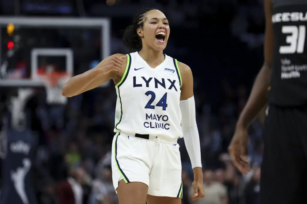 Minnesota's Napheesa Collier celebrates a play during a 2025 WNBA game.