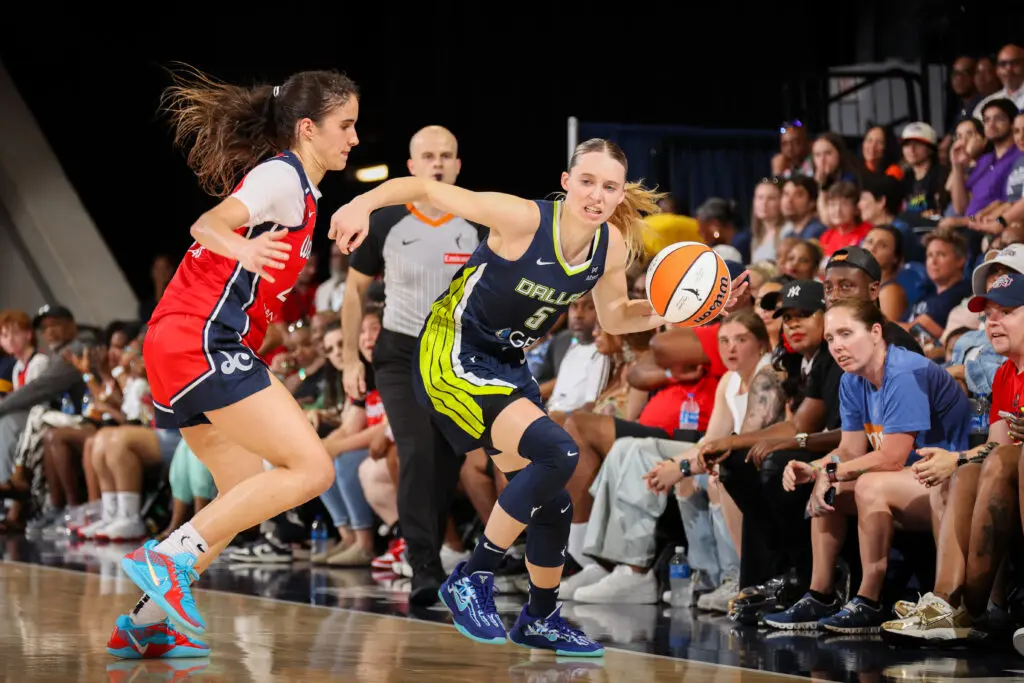 Washington Mystics rookie Sonia Citron guards Dallas Wings rookie Paige Bueckers during a 2025 WNBA game.