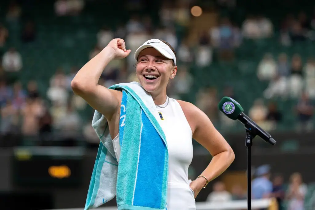 US tennis star Amanda Anisimova celebrates her 2025 Wimbledon Round of 16 win before addressing the London crowd.