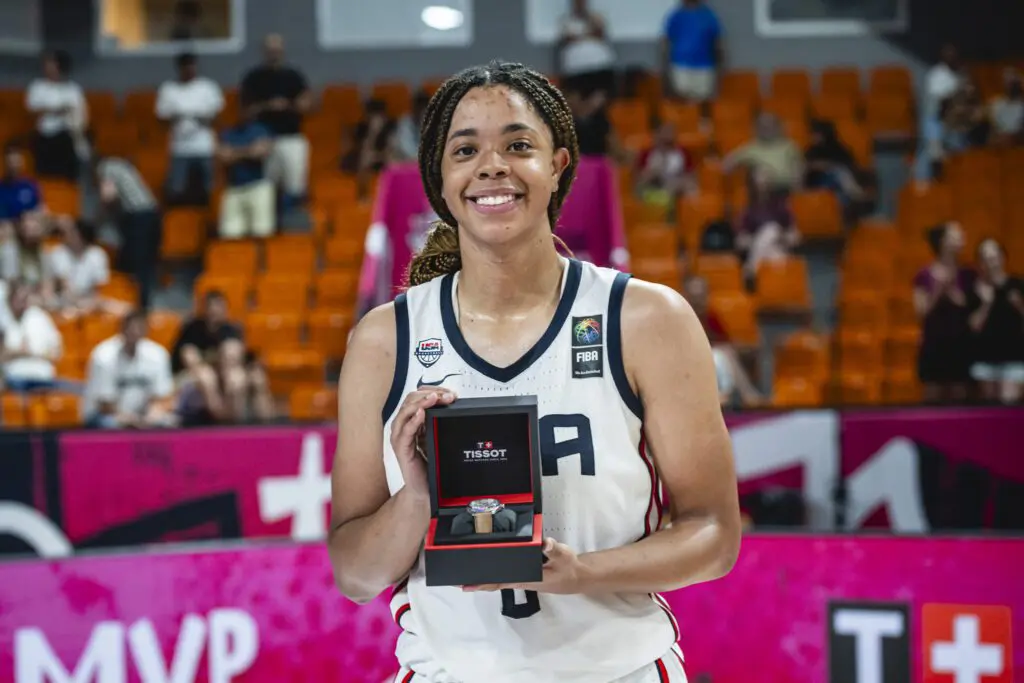 Young Team USA star Saniyah Hall poses with her 2025 FIBA U19 World Cup MVP trophy.