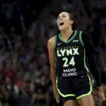 Minnesota Lynx star Napheesa Collier celebrates a three-pointer during a 2025 WNBA game before WNBA free agency.