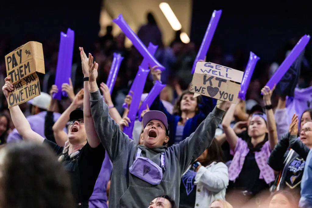 Golden State Valkyrie fans cheer during a 2025 WNBA game.