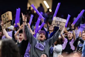 Golden State Valkyrie fans cheer during a 2025 WNBA game.