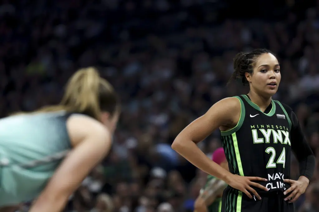 Minnesota Lynx star Napheesa Collier preps for a free throw during a 2025 WNBA game.