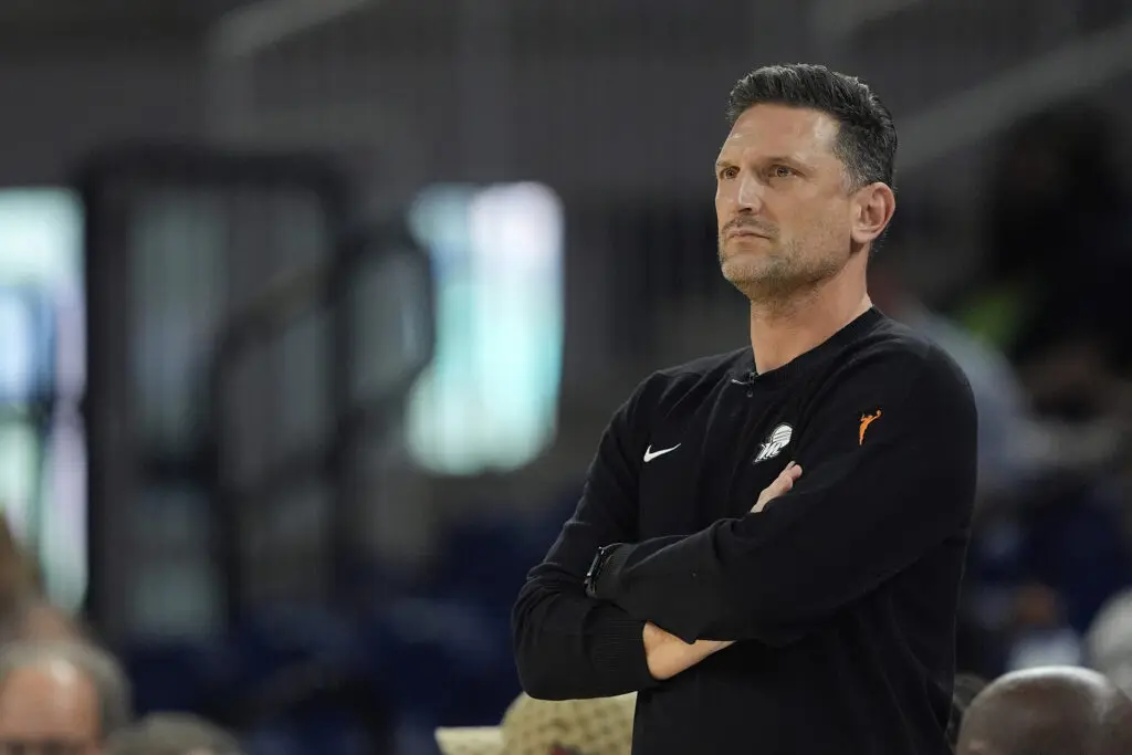 Phoenix Mercury head coach Nate Tibbetts watches on the sideline during a 2025 WNBA game.