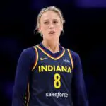 Indiana Fever guard and USA Network contributor Sophie Cunningham looks on during a 2025 WNBA game.
