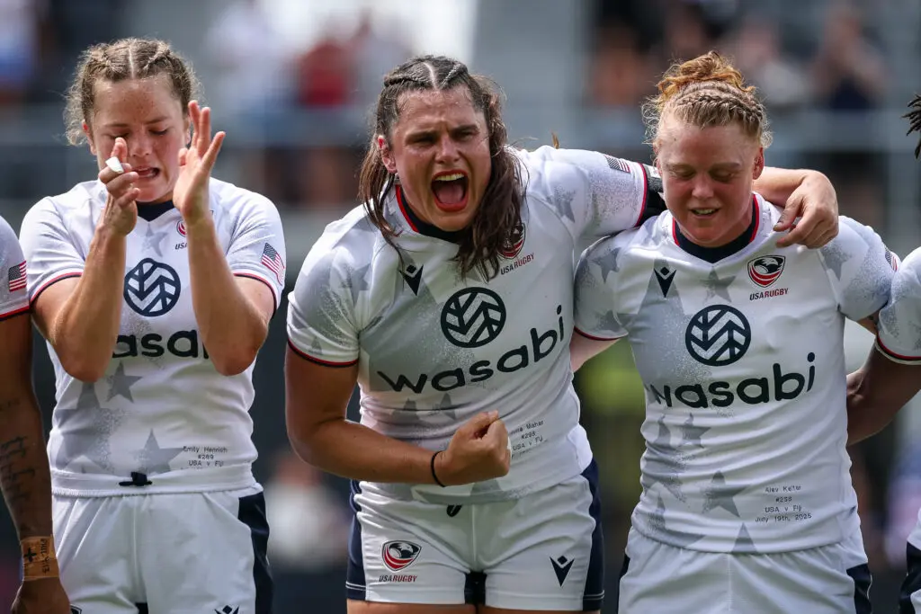 USA Rugby teammates Emily Henrich, Ilona Maher, and Alev Kelter celebrate before a 2025 game.