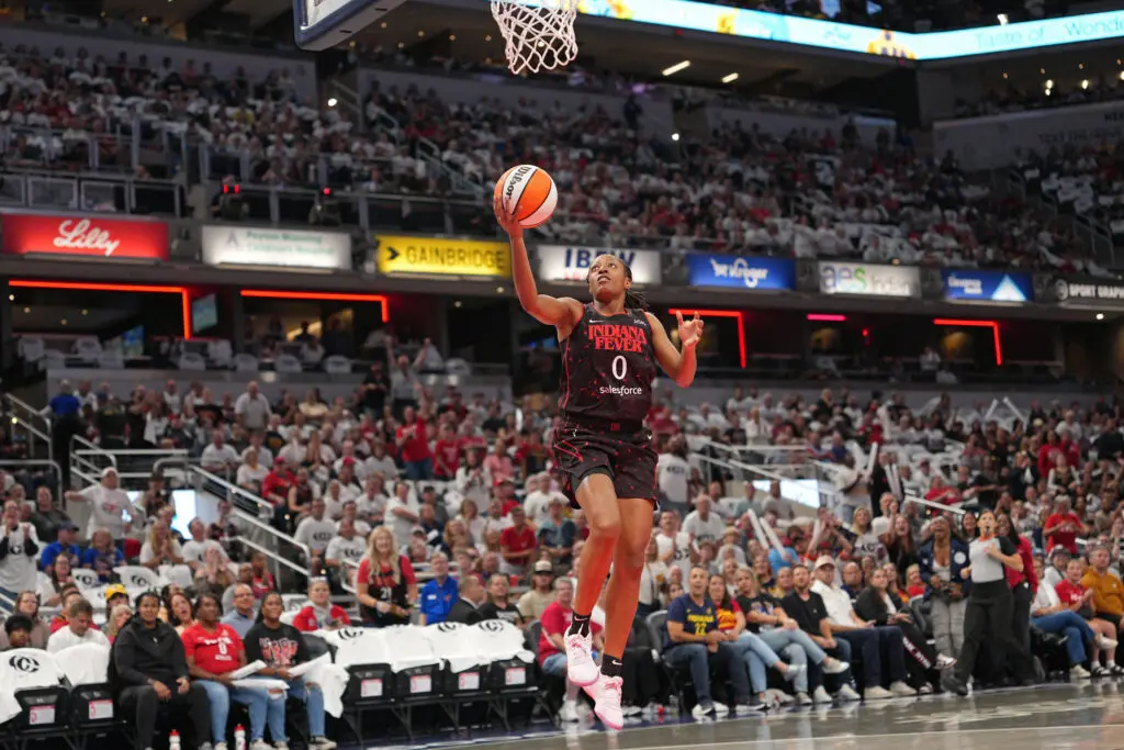 Indiana Fever guard Kelsey Mitchell lays up a shot during a 2025 WNBA game.