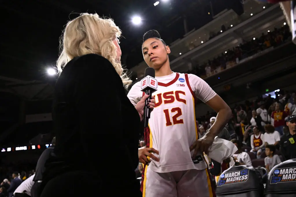ESPN journalist Holly Rowe interviews USC basketball guard JuJu Watkins during the first round of the 2024/25 NCAA tournament.