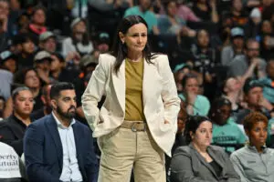 New York Liberty head coach Sandy Brondello watches from the sideline during a 2025 WNBA game.