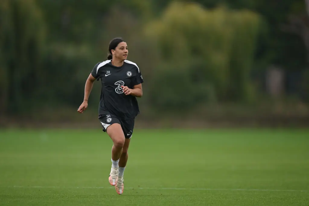 Chelsea FC forward Sam Kerr runs across the pitch during a 2025 training session.