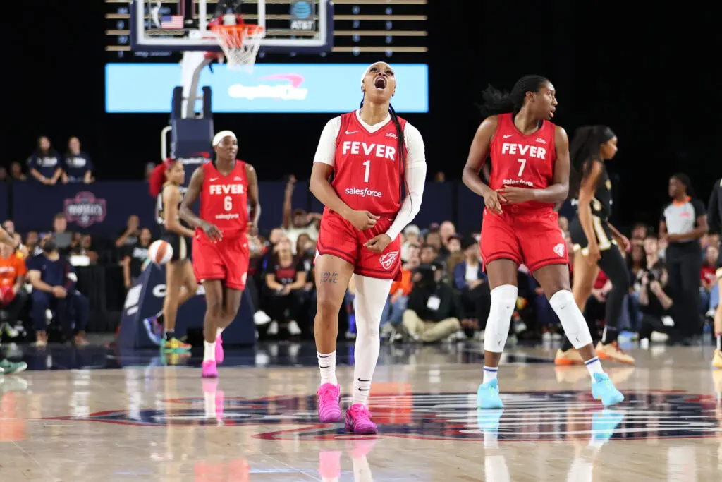 Indiana Fever guard Odyssey Sims yells in celebration after a 2025 WNBA game.