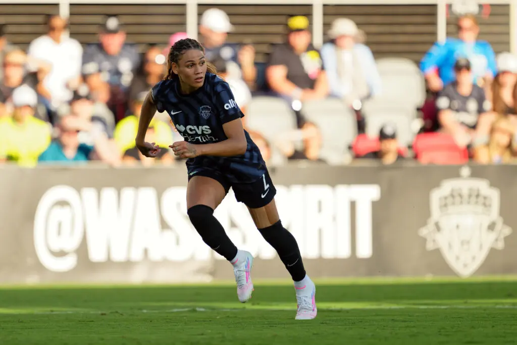 Washington Spirit forward Trinity Rodman sprints up the pitch during a 2025 NWSL match.